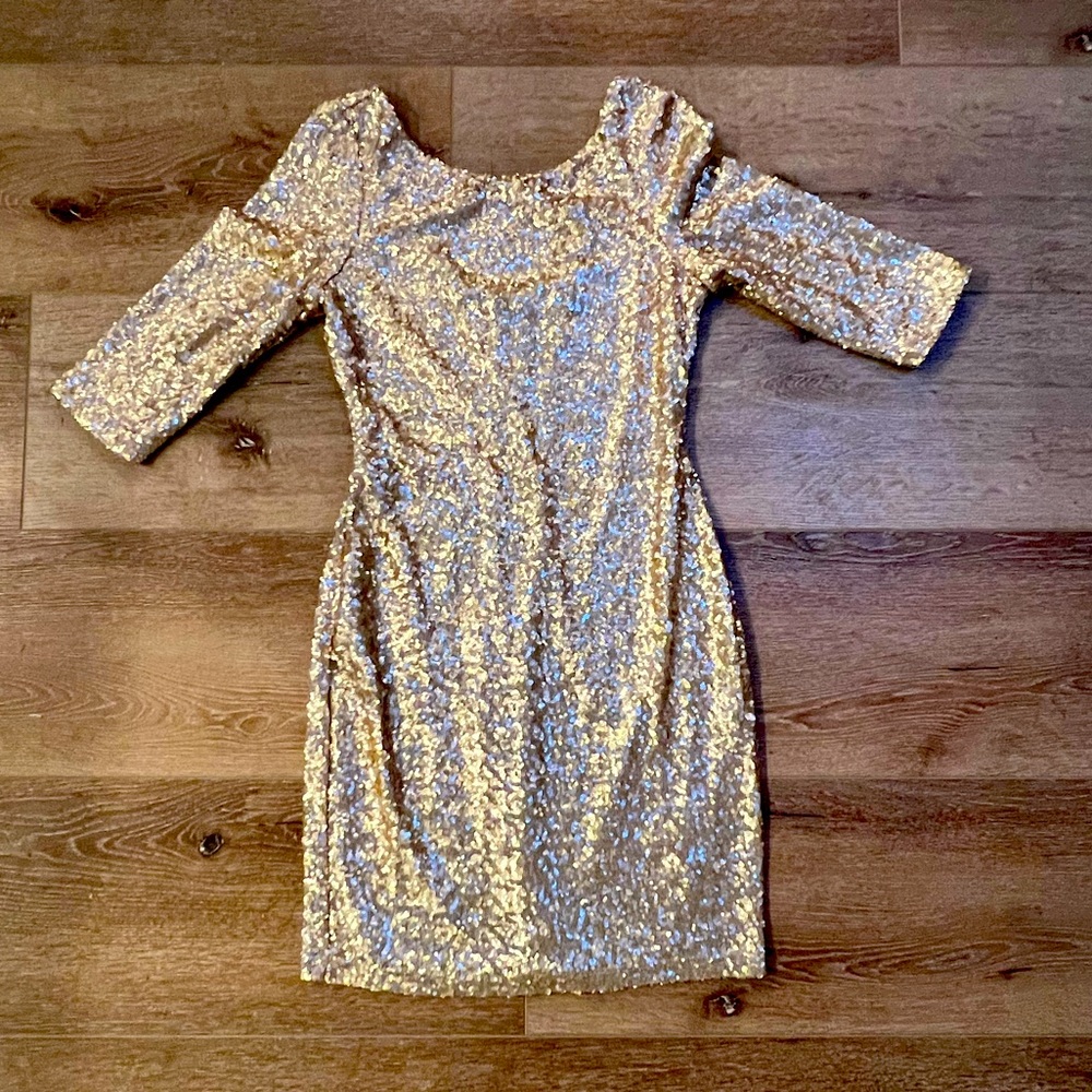 Body contouring Gold sequin stretch mini dress.